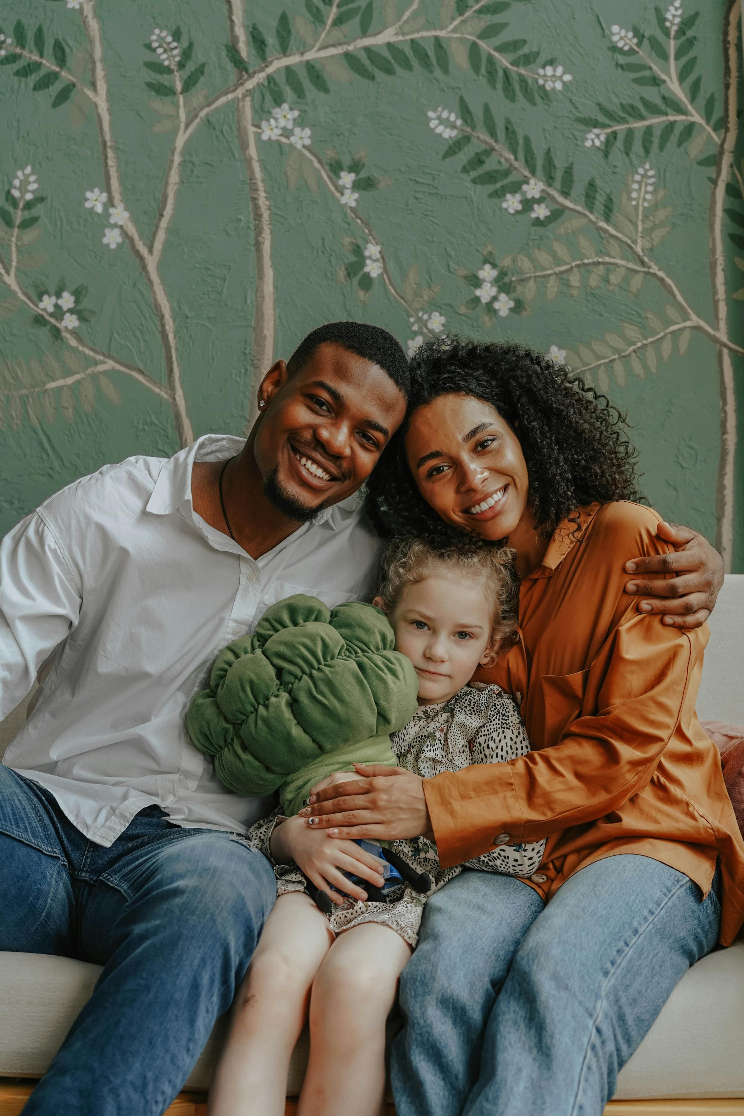 Family relaxing together at home in their residential community